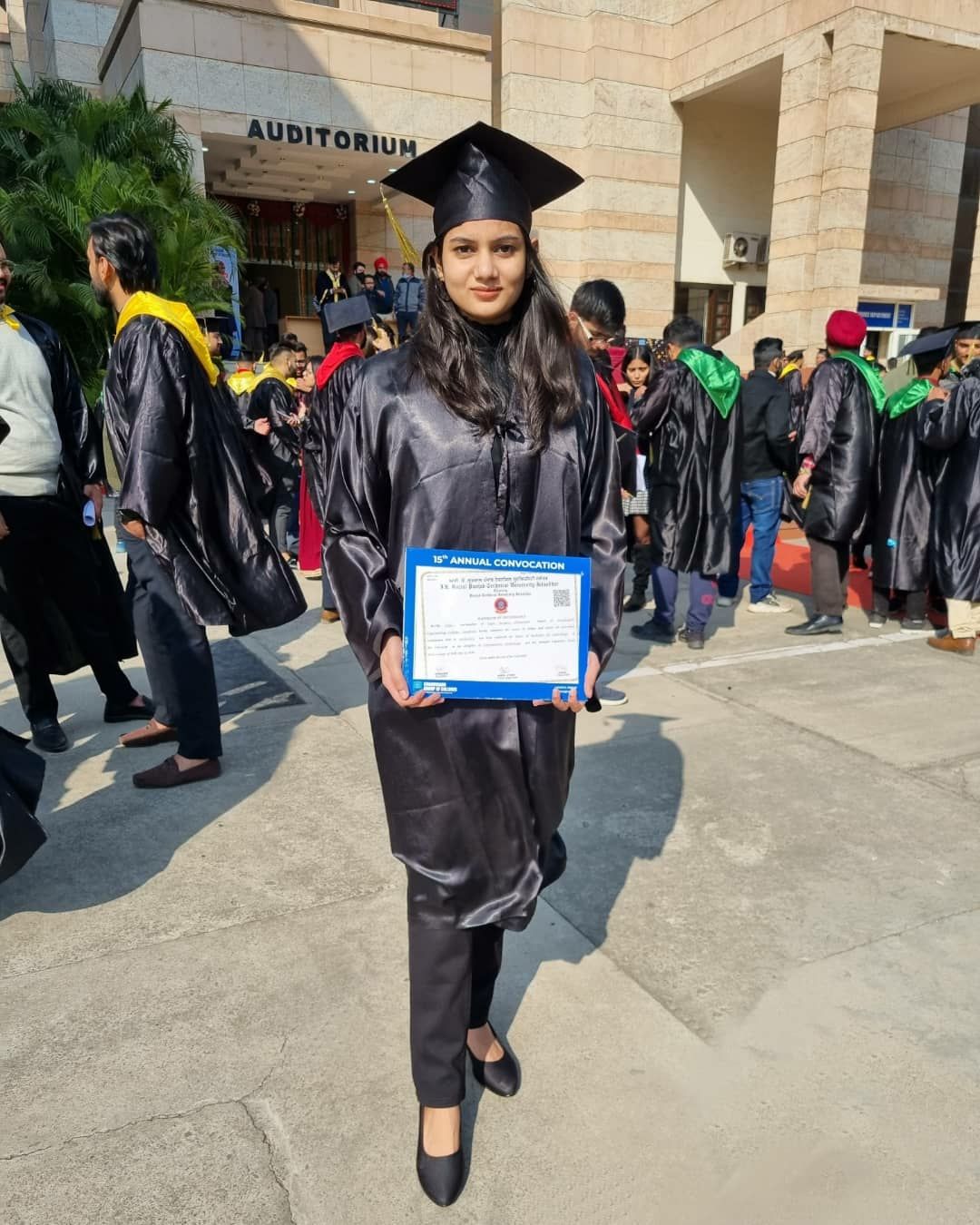 Me with ceremonial dress & degree